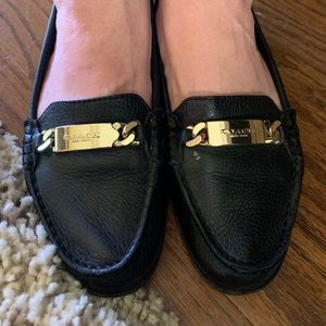 Coach slip on shoes.